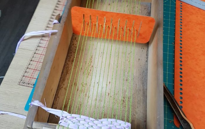 métier à tisser avec peigne envergeur